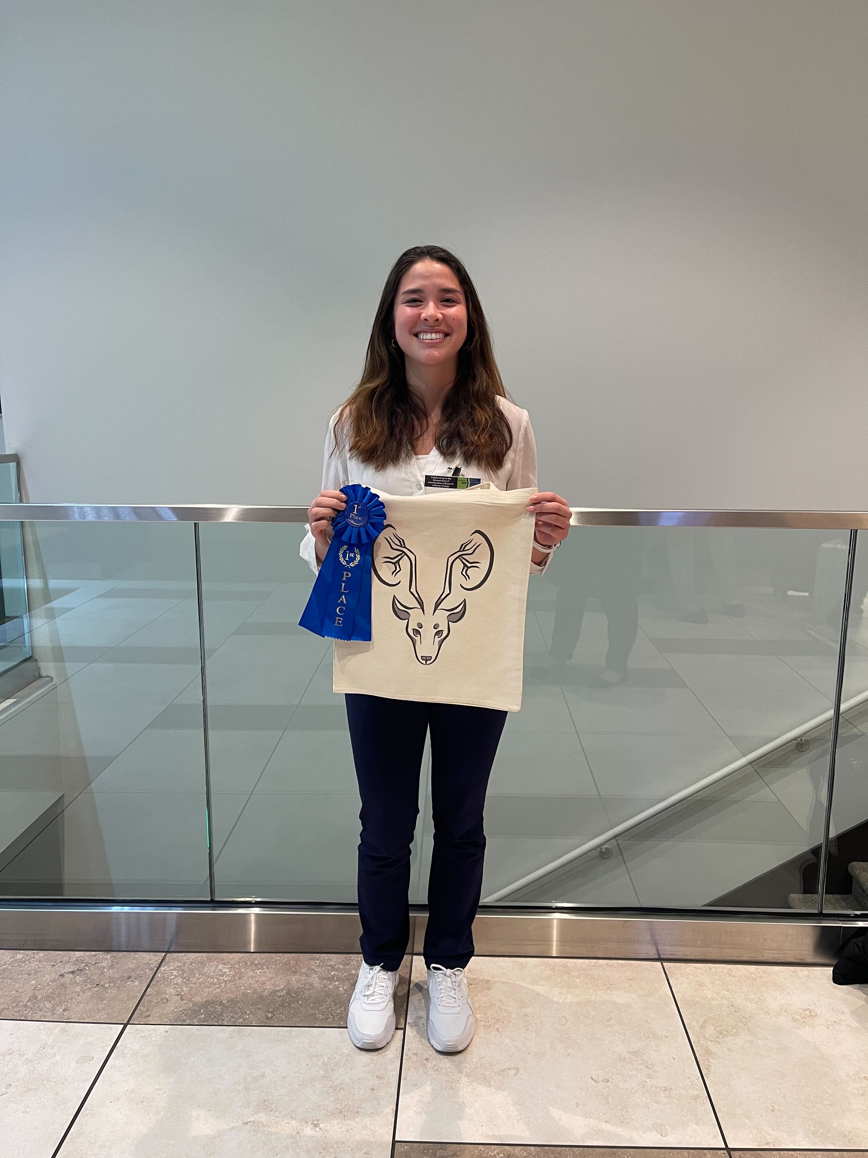 Hannah Wins Best Poster Award at Cairibu 2024